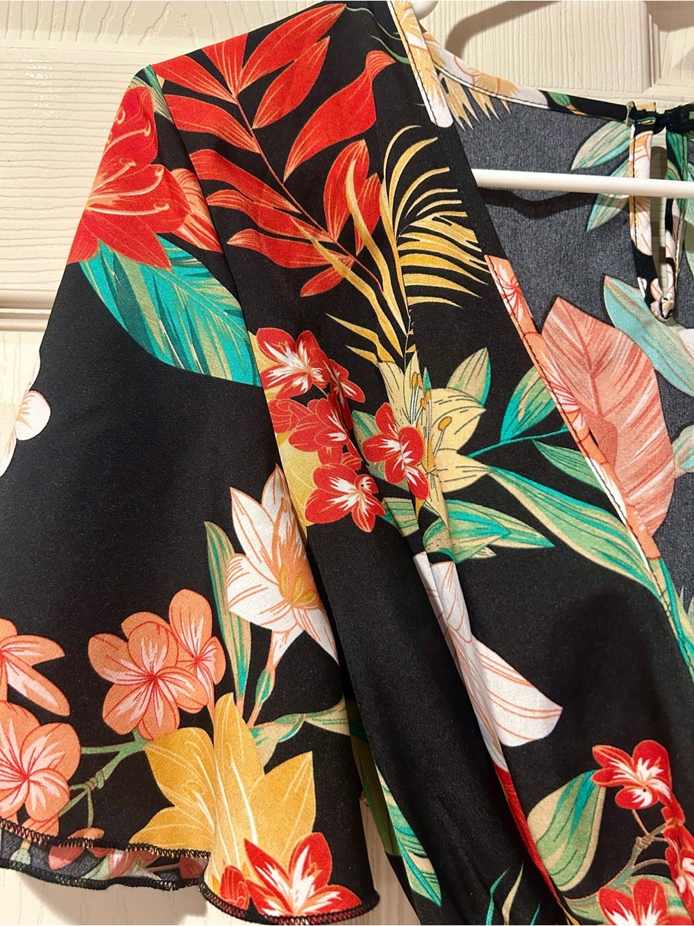 SHEIN Black Tropical Floral Wrap Romper with Red & Green Accents - Picture 2 of 4